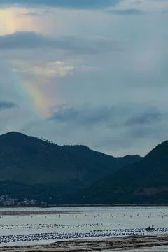 A rainbow by the seaside. Photos