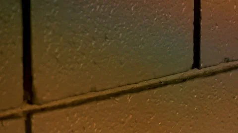 Rainbow Shadow Over Cinder Block Wall 3 Stock Footage 85823377