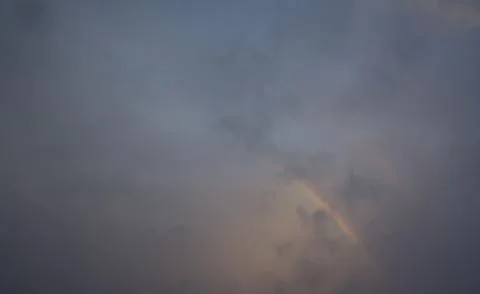 A rainbow in sky after rain Foto stock