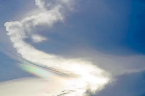 Rainbow on the sky and clouds in the evening Stock Photos