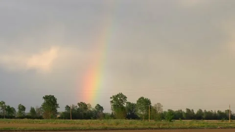 Rainbow in the sky. Landscape. Panning 4K Video stock 154582168