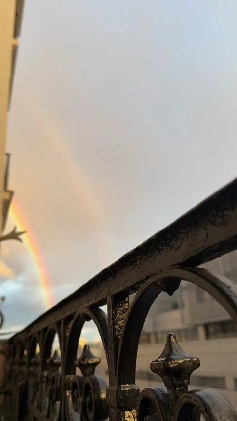 Rainbow In sky with time lapse clouds in vertical video Stock Footage 282993028