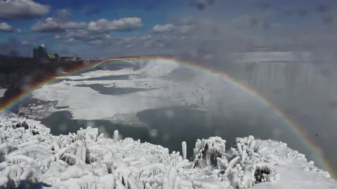Rainbow on a snowy winter day Stock Footage 208677629
