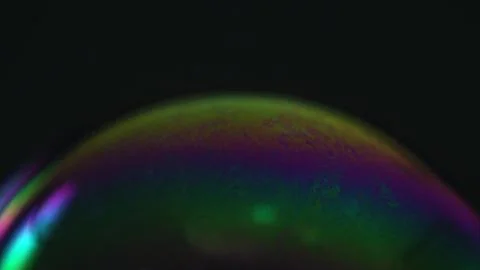 Rainbow soap bubble on a dark background. Close-up of colorful surface Stock Illustration