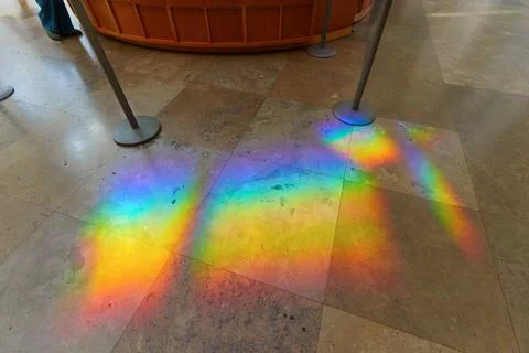 Rainbow Spectrum of Light Projected on Stone Museum Floor Stock Photos