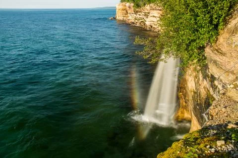 Rainbow in the spray Stock Photos