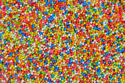 Rainbow sprinkle sugar background, Multicolor sugar texture wallpaper, Sugar  Stock Photos