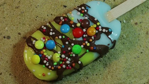 Rainbow Sprinkles Popsicle Melts Stock Footage 75690903