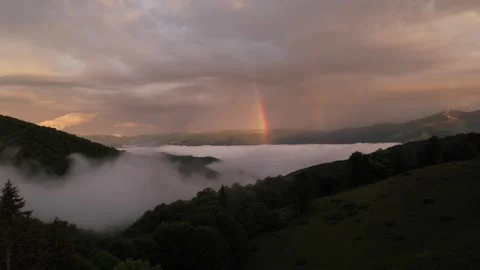 Rainbow at a sunset in mountains Stock Footage 304783578