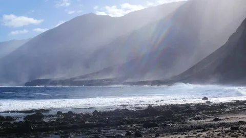 Rainbow through the haze of the waves Video stock 137132902