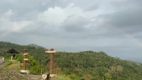 Rainbow on the top of the hill Stock Footage 144098577