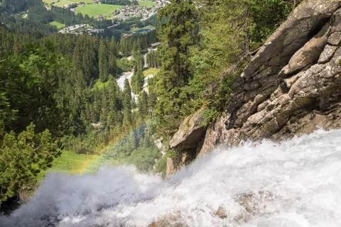 Rainbow at the top of a waterfall Stock Photos