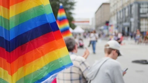 Rainbow umbrella on sky background 動画素材 106852047