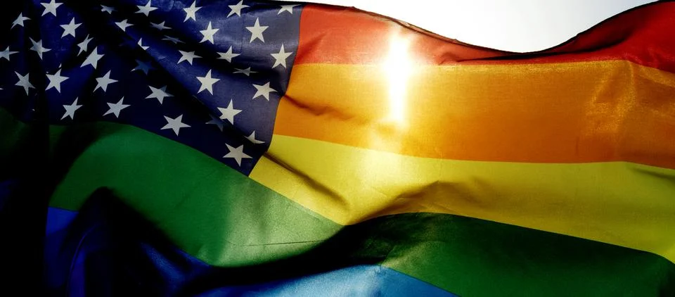Rainbow US flag waving on the sky, web banner Stock Photos