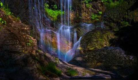 Rainbow in a waterfall Stock Photos