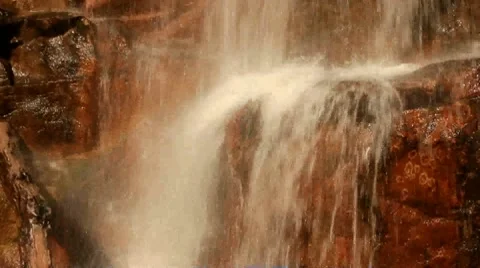Rainbow in a waterfall on rocks Stock Footage 10758859