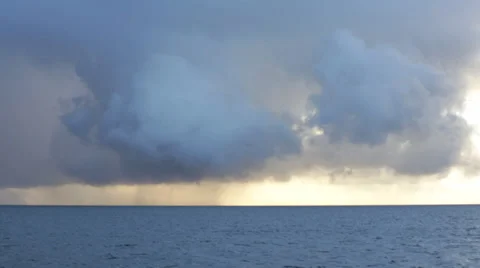 Rainclouds at the sky in front of the sky on a sunny day Stock Footage 36838212