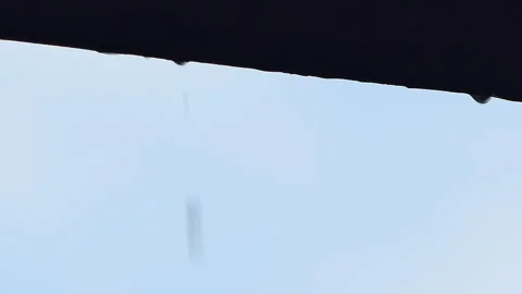 Raindrop and dripping on rooftop. Video stock 306558835