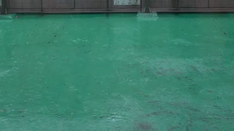 Raindrop fall bounce against on floor, flood from rainstrom typhoon in bad .. Stock Footage 308995902