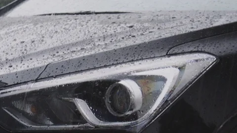 Raindrop falling on car Stock Footage 93005045