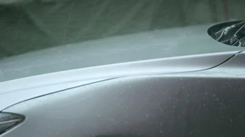 Raindrop infront of car, heavy rain Stock Footage 242133713