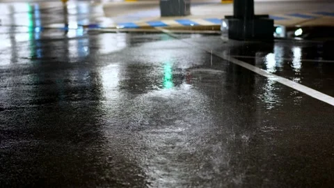 Raindrop in parking place Stock Footage 236844208