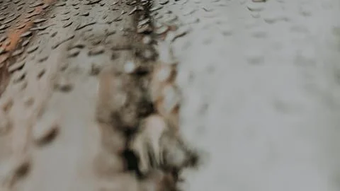 Raindrop patterns on a bus windshield. Stock Photos