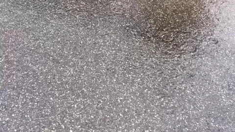 Raindrop on puddle Stock Footage 266050310