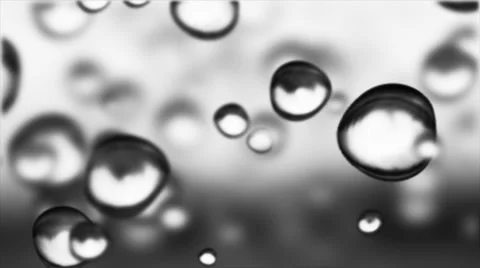 Raindrop series - macro of raindrops falling. Loopable background. Stock Footage 44562813