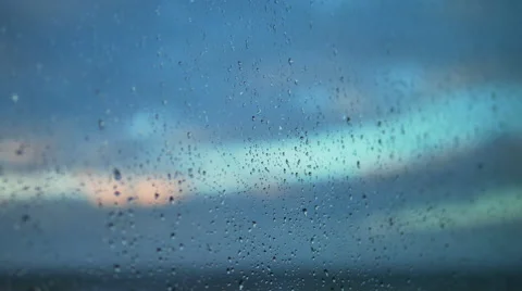 Raindrop slide on glass. Depth on field. After the rain.  Vidéo 60581355