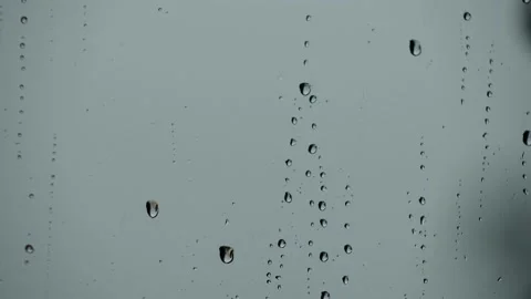 Raindrop slides down from wet glass. Video 4K 库存影片 154585597