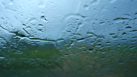 Raindrop on window blue background aqua bubble texture Stockbeeldmateriaal 264463919