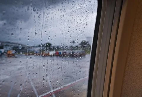Raindrops on an airplane window Stock Photos