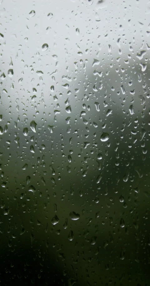 Raindrops are running down the window glass. Bad weather outside. Rain stor.. Stock Footage 337013648