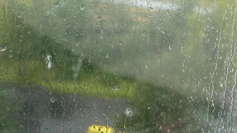 Raindrops are streaming down the window. Stock Footage 161311454
