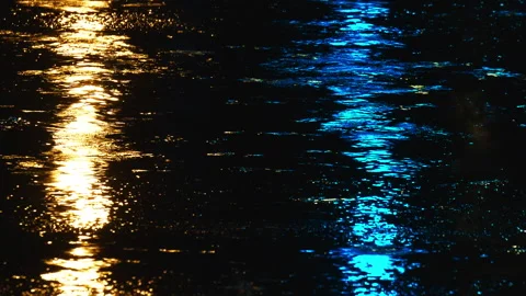 Raindrops on asphalt at night Видео 217662009