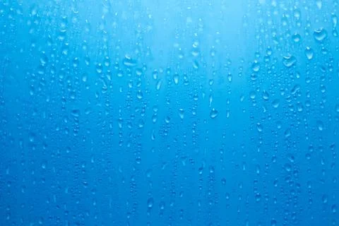 Raindrops on blue background Foto stock