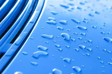 Raindrops on blue Stock Photos