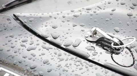 Raindrops on a body of a racing car Stock Footage 52456877