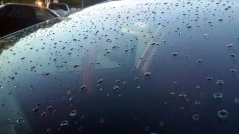 Raindrops on the car glass Stock Photos