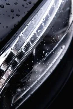 Raindrops on car headlights Foto stock