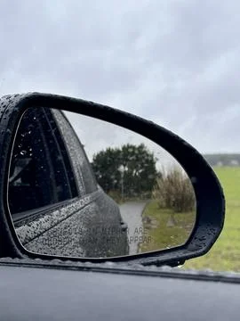 Raindrops on Car Mirror Stock Photos