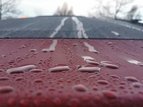 Raindrops on a car Stock Photos