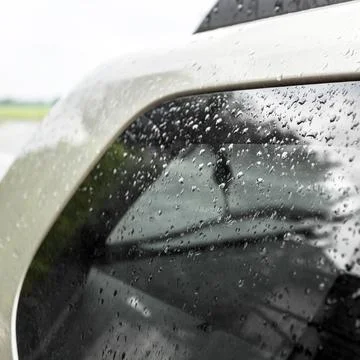 Raindrops on the car Stock Photos
