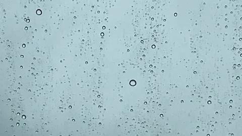 Raindrops on Car Window  4K Stock Video Stock Footage 246950480
