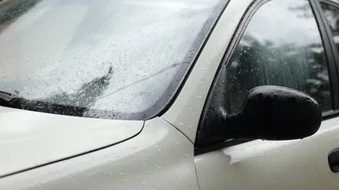 Raindrops on the car window. Bad weather, gloomy and raining Stock Footage 245299135