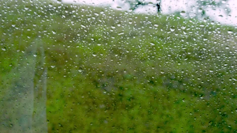 Raindrops on a car window Video stock 150674567