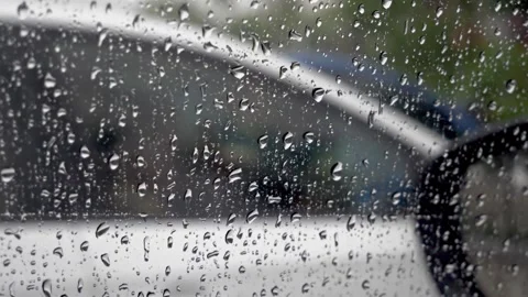 Raindrops on the car window Stock Footage 155670336