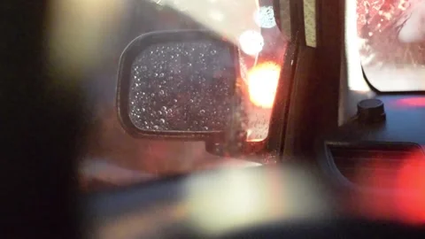 Raindrops on the car window Stock Footage 164978393