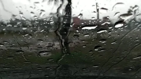 Raindrops on the car window Stock Footage 292941321